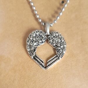 Intricate Silver Winged Heart Necklace